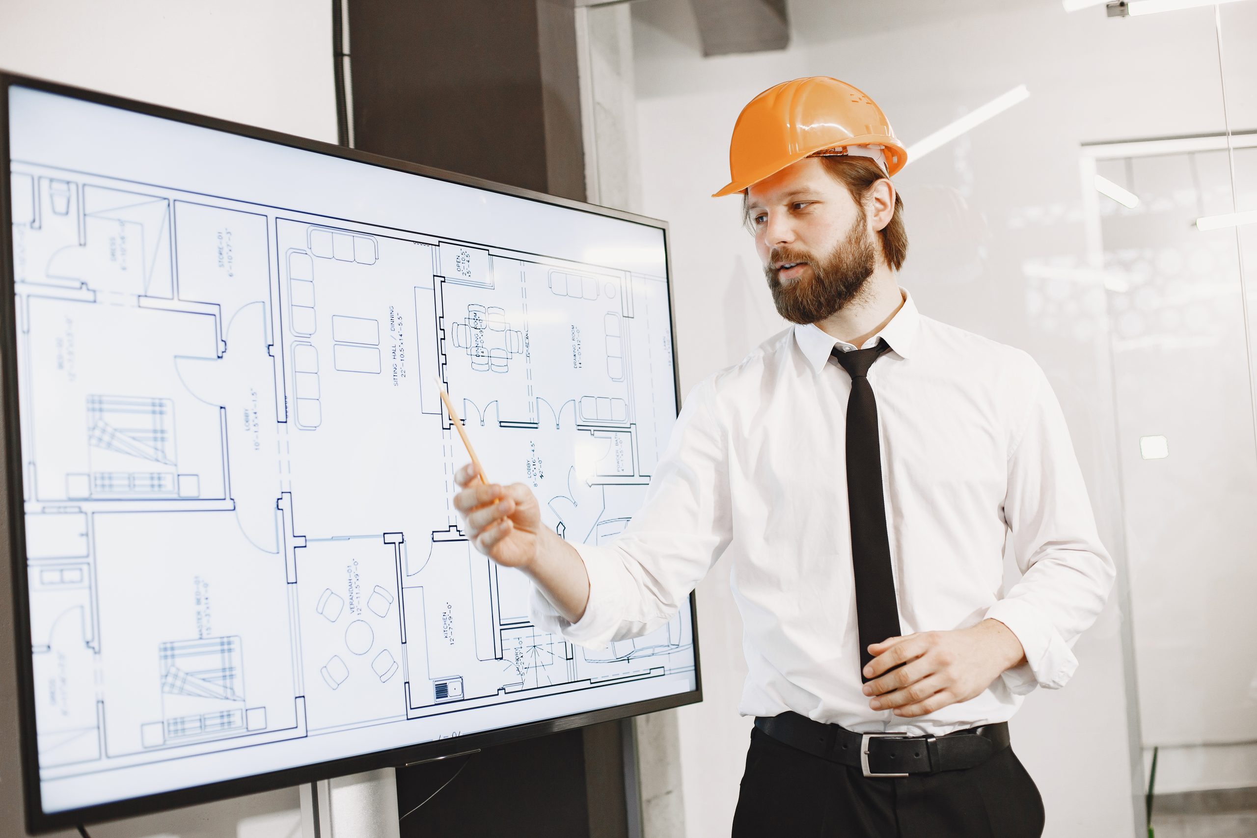 man explaining how to use BIM services.