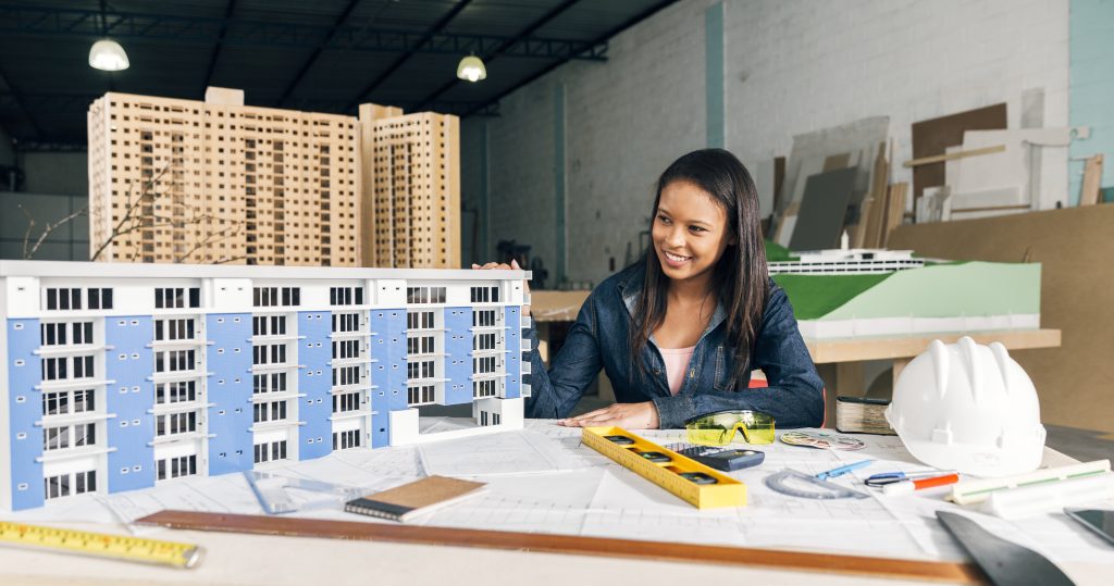 woman leveraging BIM implementation benefits.