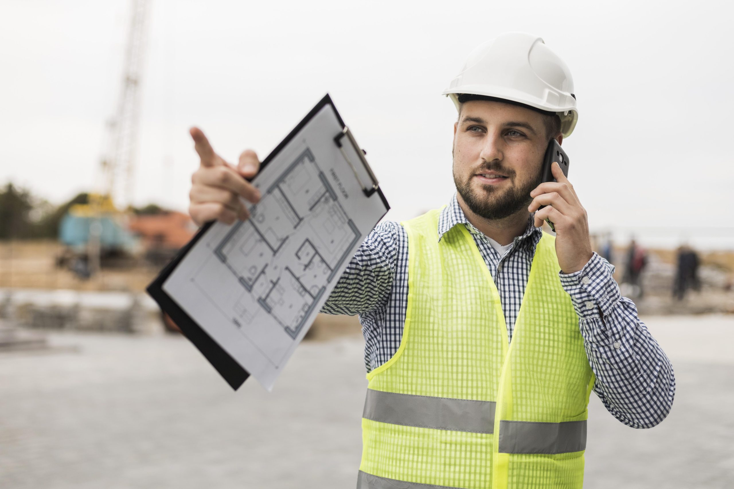 construction worker discussing construction project cost breakdown.