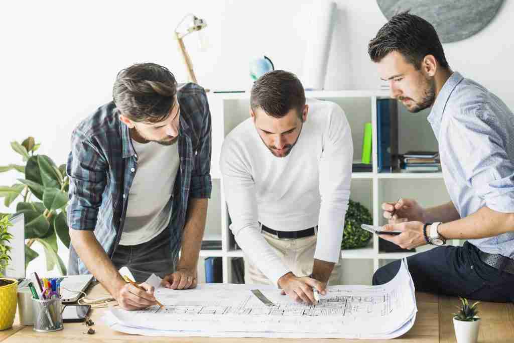 male architects using architectural design services for project.