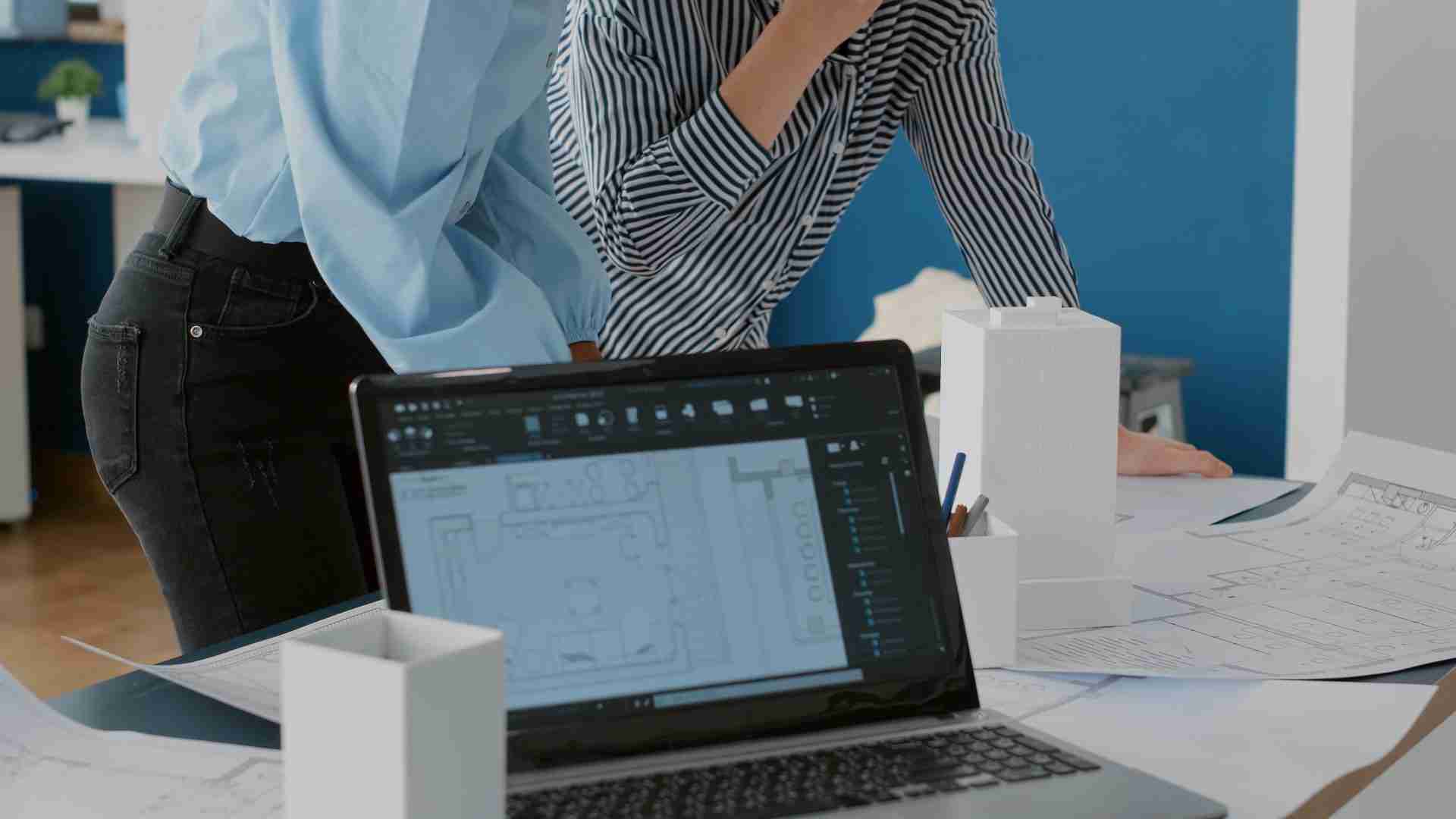 multi-ethnic working together on BIM execution plan using BIM outsourcing services.