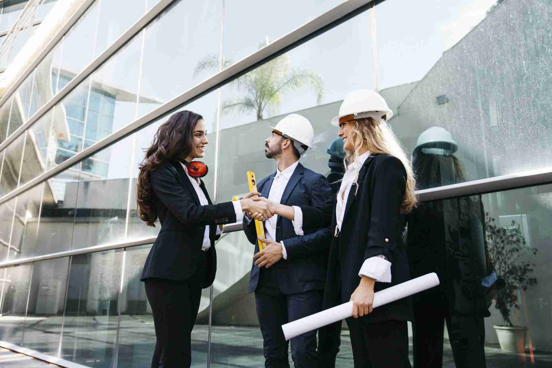 three architects signifying construction coordination.