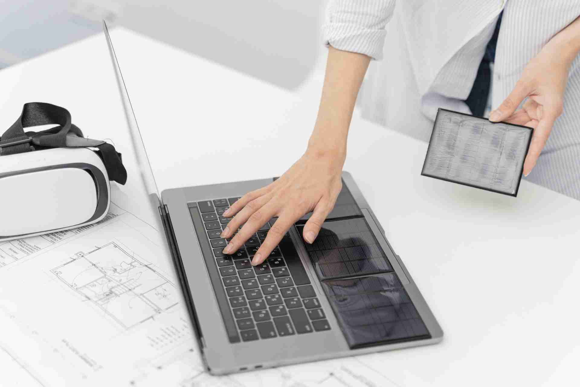 image of laptop signifying how to reduce costs on construction projects.